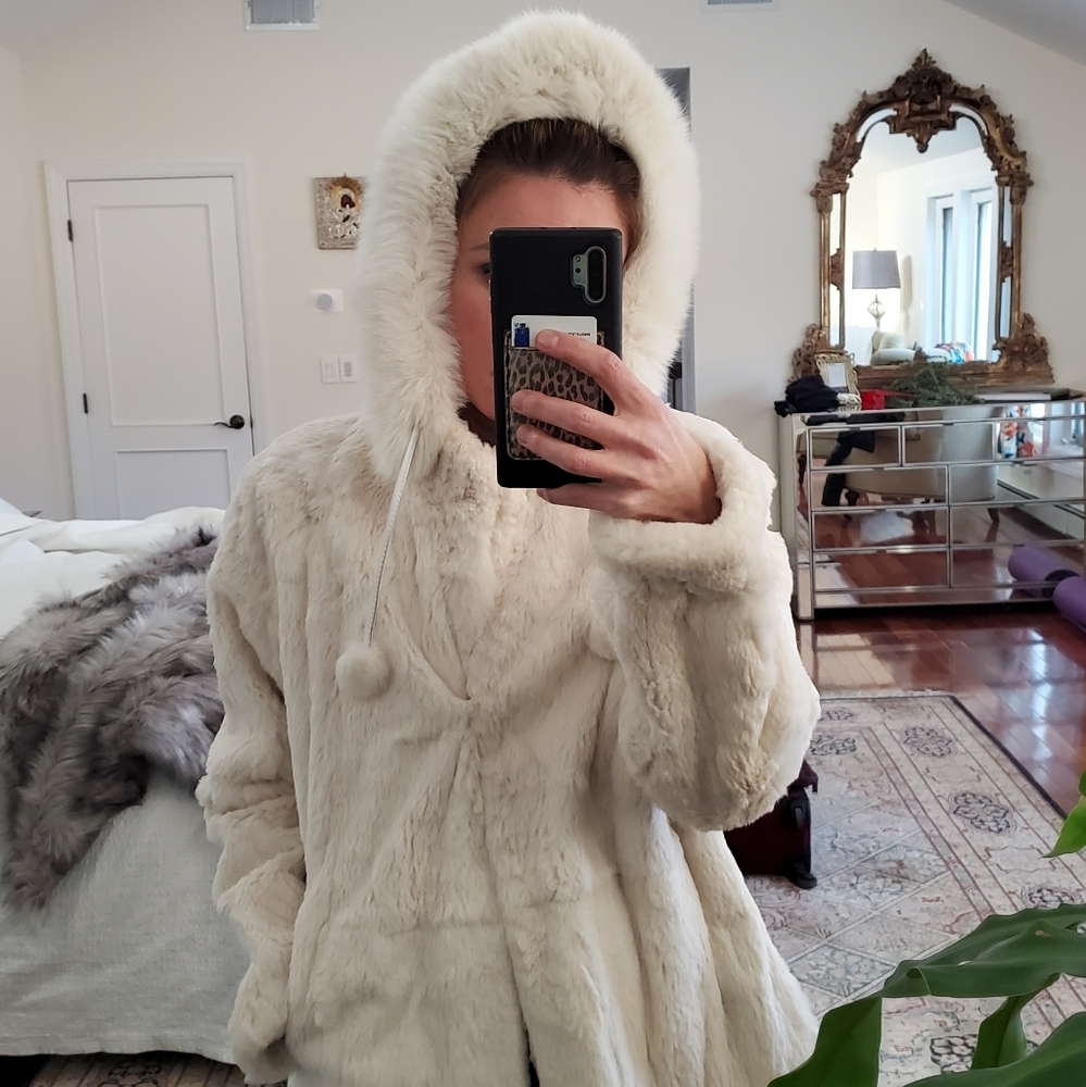 Beautiful white fur jacket with hood